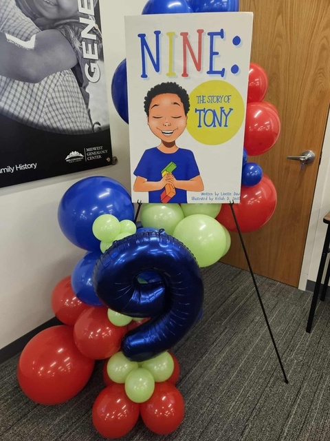 NINE: The Story of Tony book displayed at a launch event